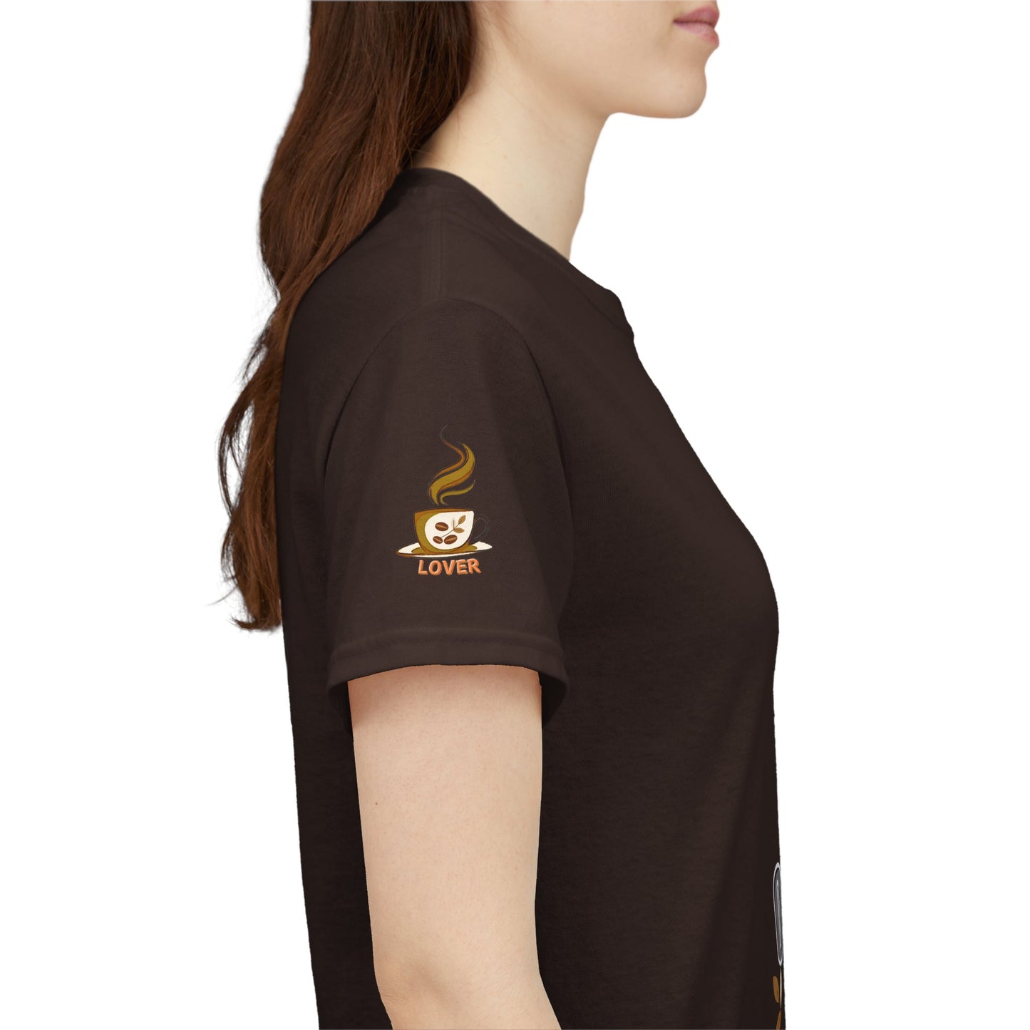Coffee Lover's Heavy Cotton Unisex T-shirt, Person wearing a brown t-shirt with a coffee-themed design on the sleeve.