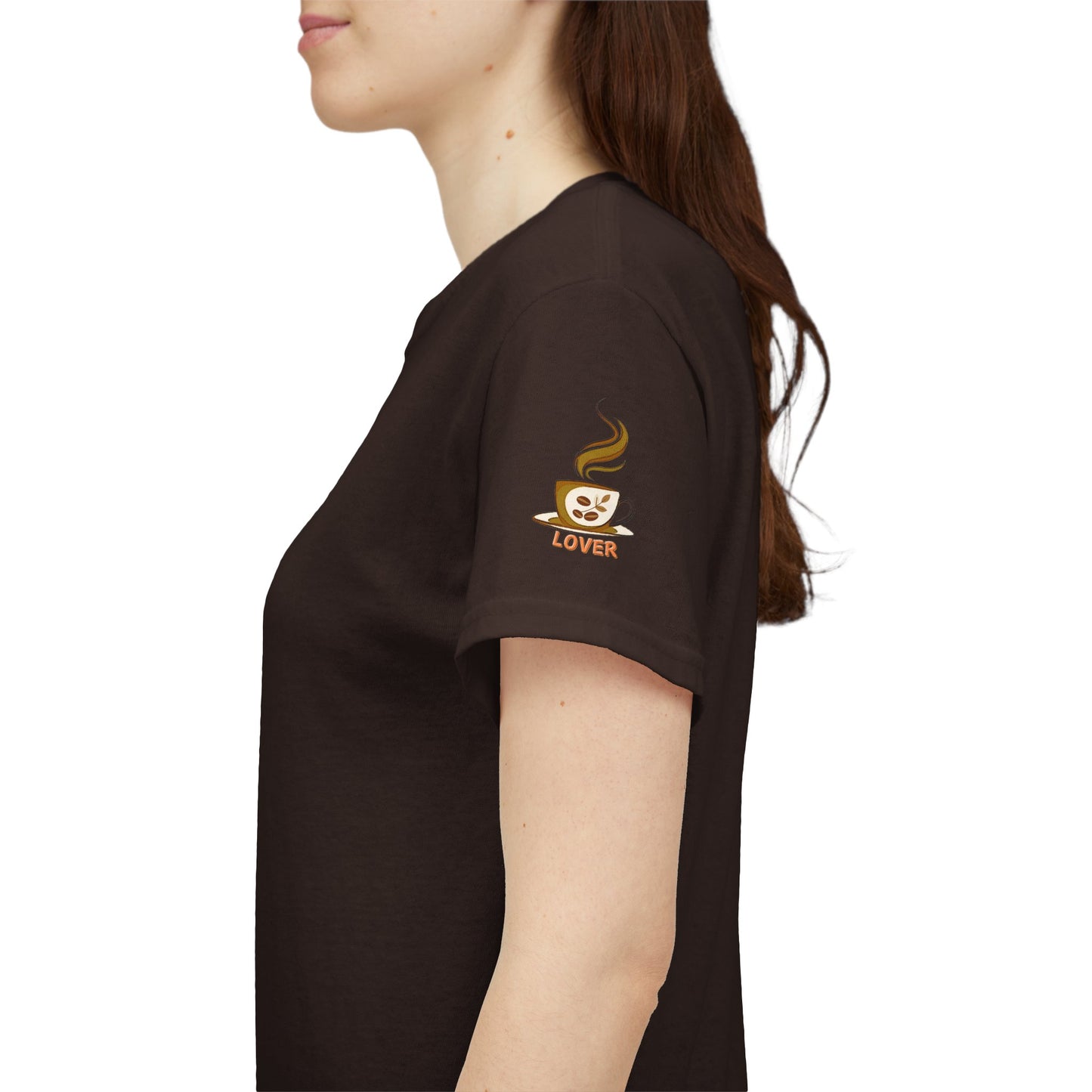 Coffee Lover's Heavy Cotton Unisex T-shirt, Person wearing a brown t-shirt with a coffee-themed design on the sleeve.