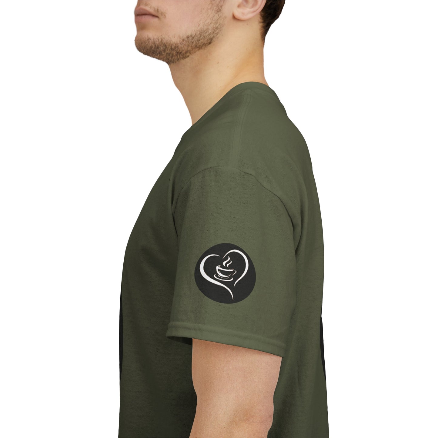 Person wearing a green t-shirt with a black logo on the sleeve against a white background