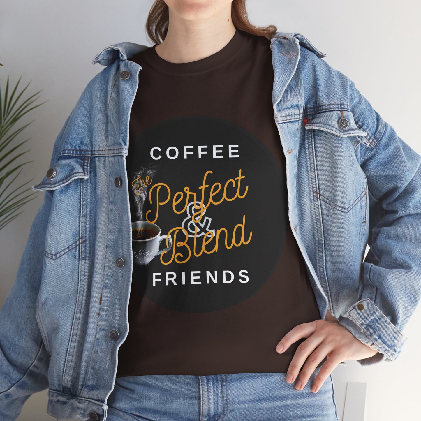 Coffee Lovers Cotton T-shirt, Person wearing a black t-shirt with coffee-themed text and graphics, paired with a denim jacket.