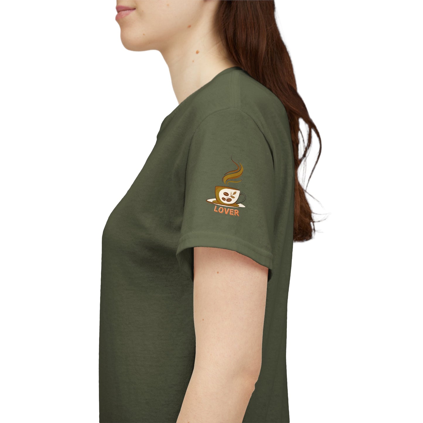 Green t-shirt with a logo on the sleeve worn by a person