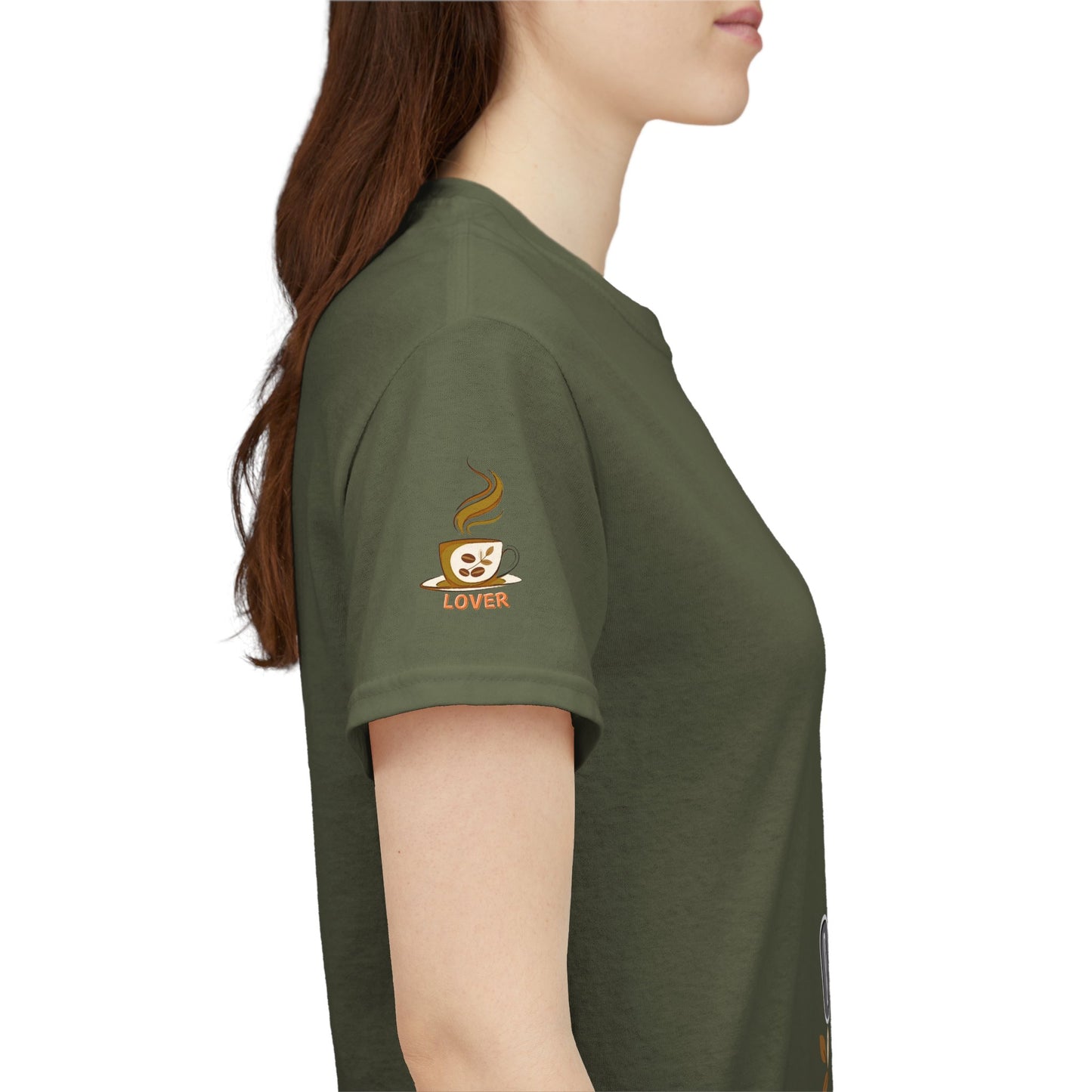 Coffee Lover's Heavy Cotton Unisex T-shirt, Person wearing a green t-shirt with a coffee-themed graphic on the sleeve.