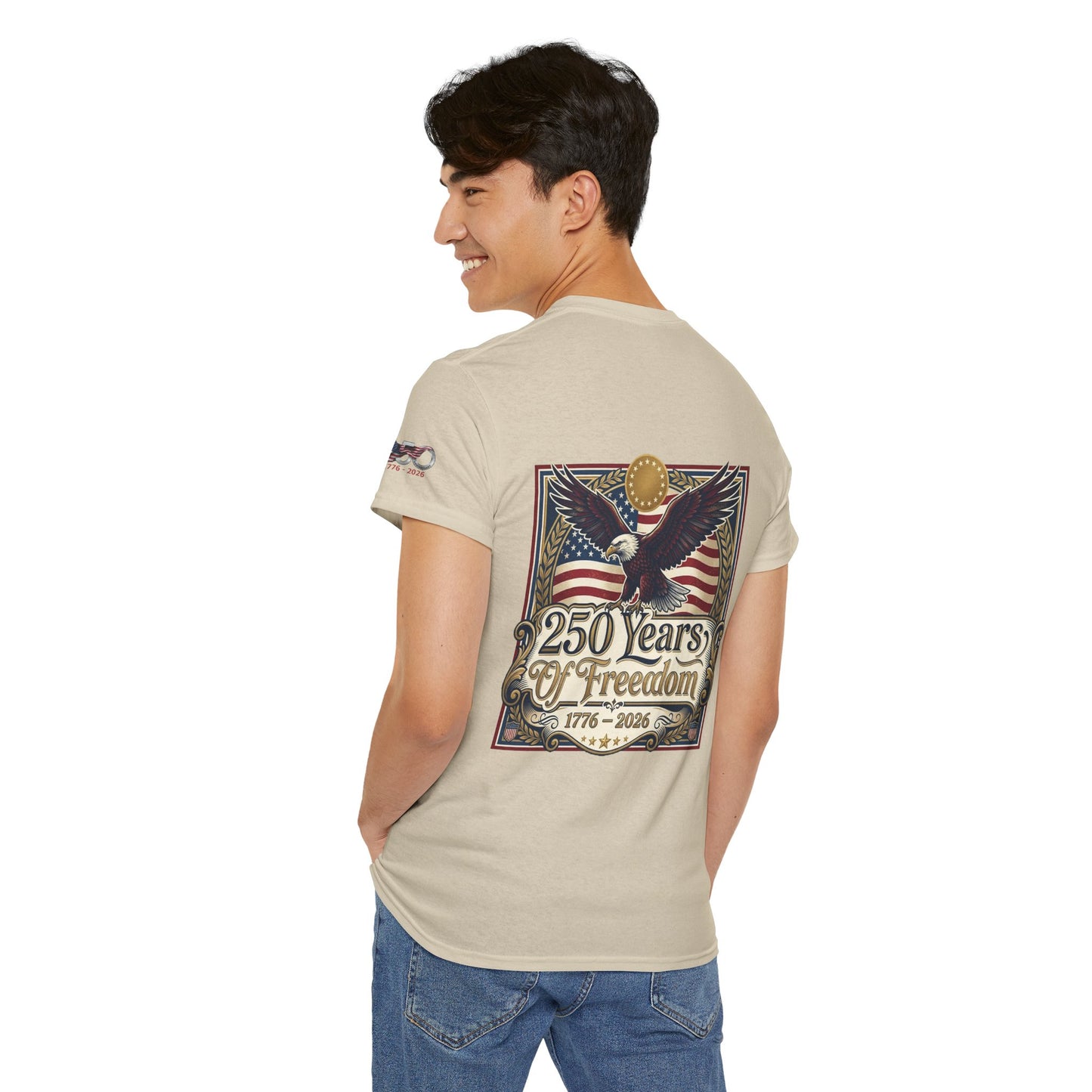 250 Years of Freedom T-Shirt — USA 250TH Anniversary Patriotic Eagle Tee, Man wearing a beige t-shirt with a graphic design on the back, standing against a white background
