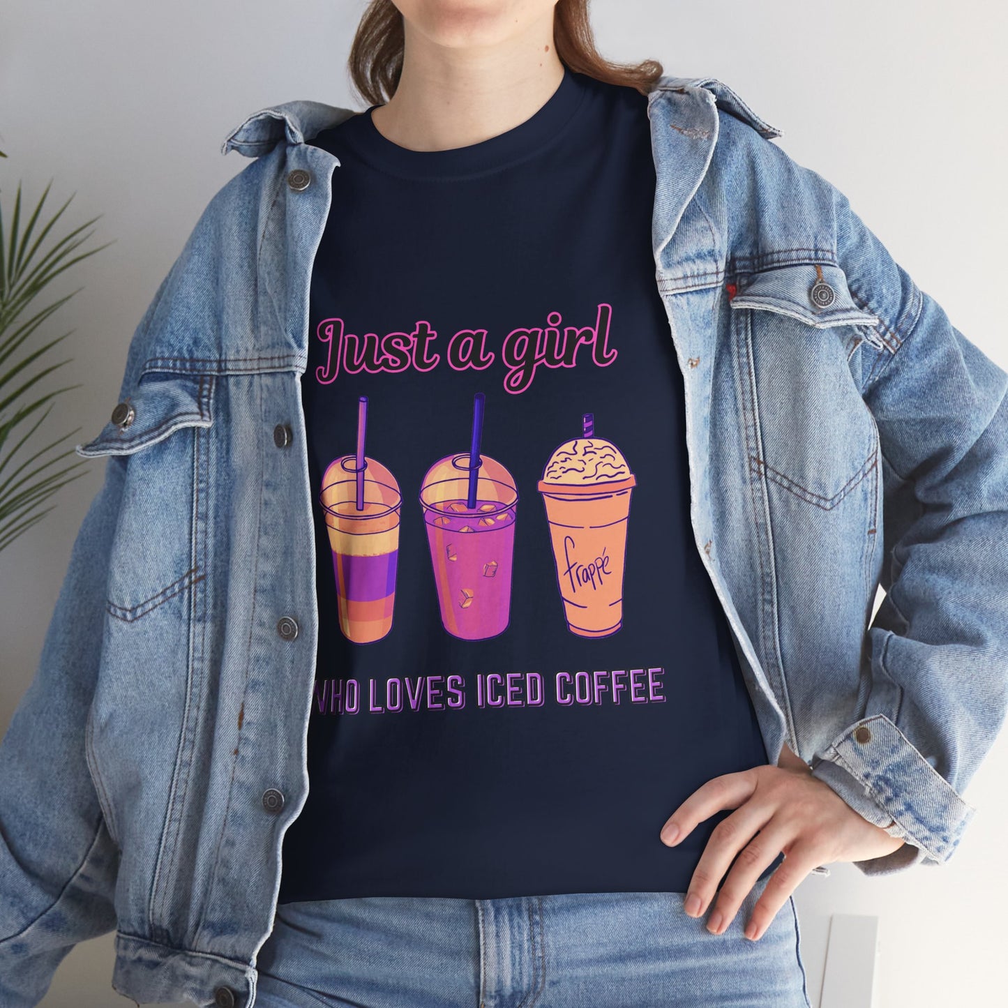 Coffee Lovers' Cotton Tee - Just a Girl Who Loves Iced Coffee, Person wearing a navy blue t-shirt with colorful drink graphics and text, paired with a denim jacket.