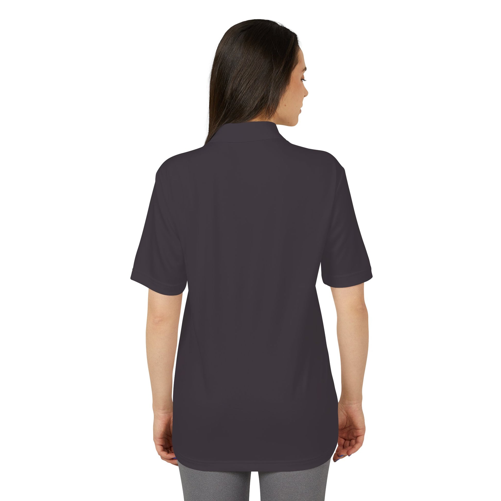 Adidas Polo shirt, Woman wearing a dark gray tunic with short sleeves on a white background
