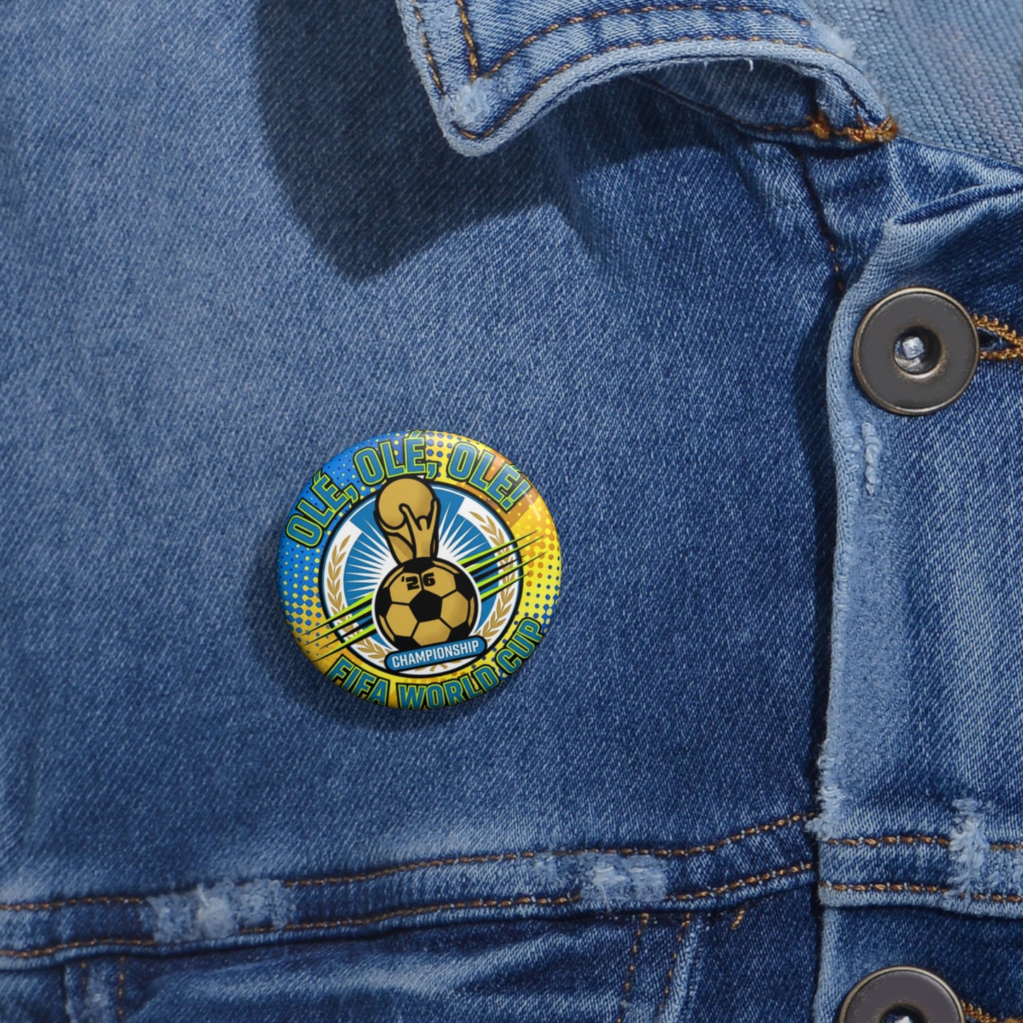 FIFA World Cup Soccer Pin Button , Close-up of a denim jacket with a colorful badge featuring a soccer ball.