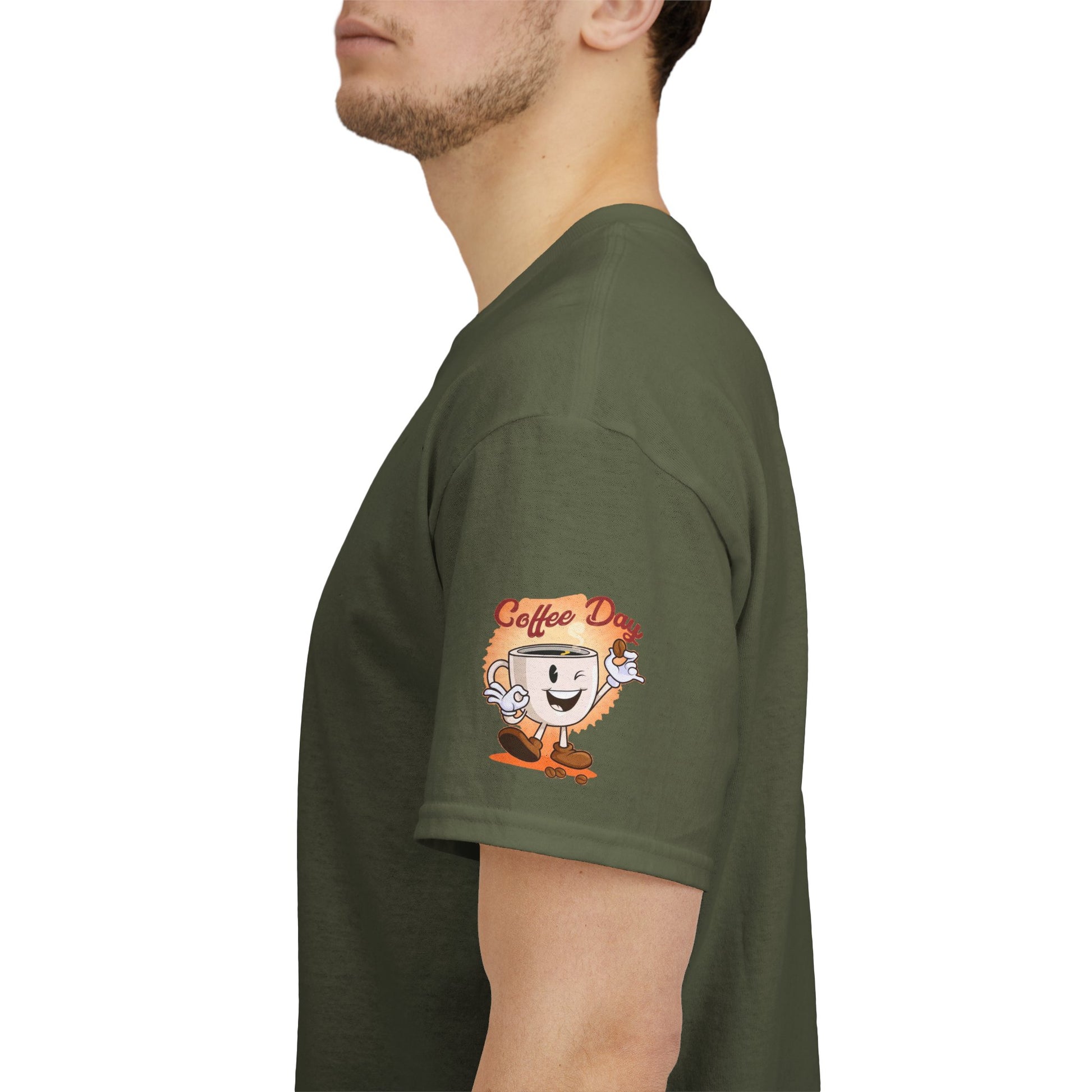 COFFEE LOVERS' T-SHIRT, Green t-shirt with a cartoon coffee design on the sleeve, worn by a person.