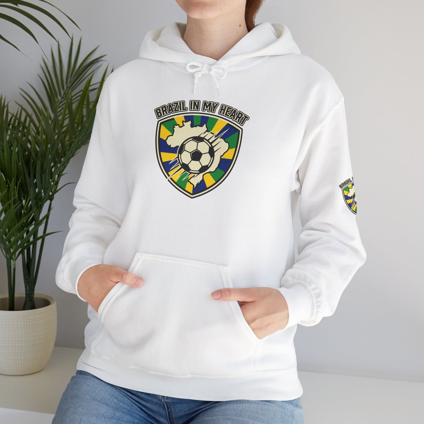 White hoodie with a graphic of a woman's face wearing sunglasses, worn by a person.| Brazil Pride Shield Soccer Hoodie | Brazil retro soccer hoodie