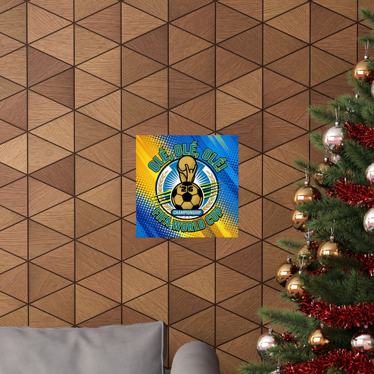 Decorative poster with a colorful design on a geometric-patterned wall next to a Christmas tree.
