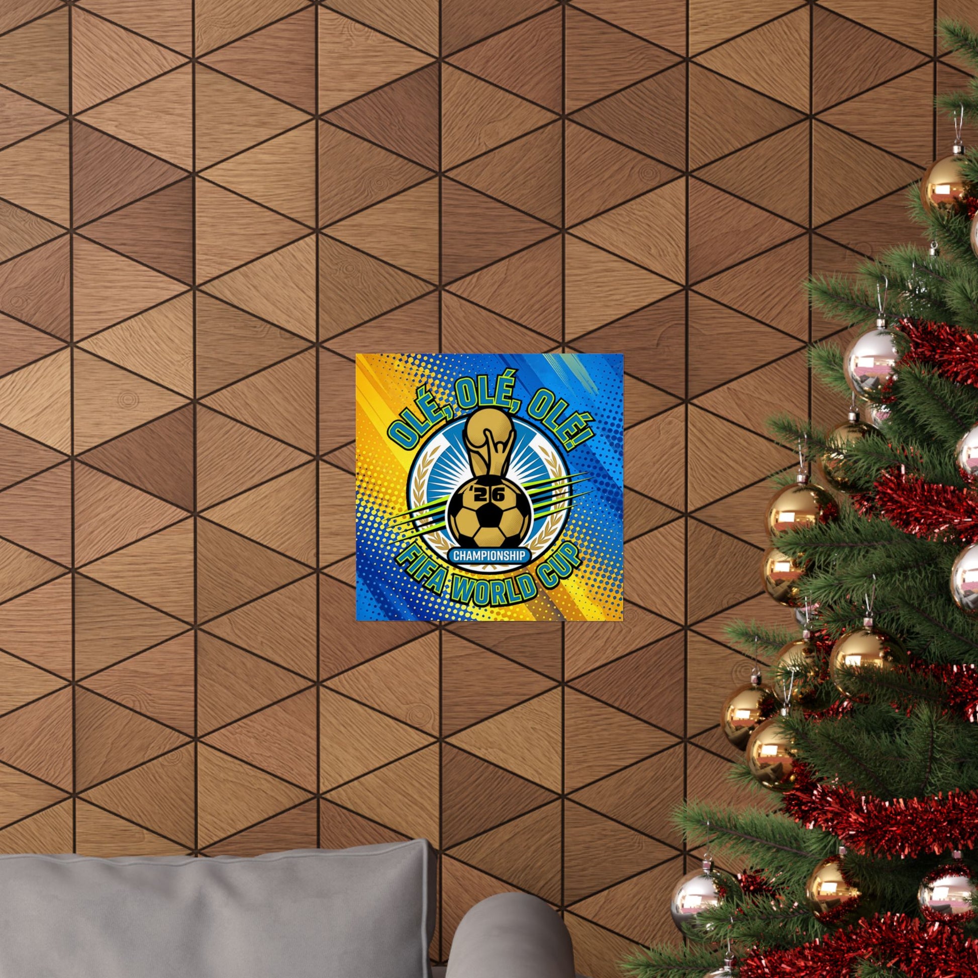 Decorative poster with a colorful design on a geometric-patterned wall next to a Christmas tree.