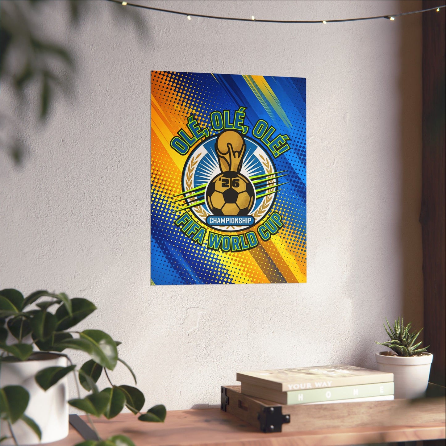 Decorative poster with soccer design on a wall above a desk with plants.