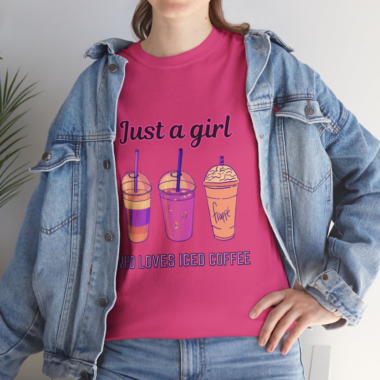 Coffee Lovers' Cotton Tee - Just a Girl Who Loves Iced Coffee, Person wearing a pink t-shirt with iced coffee graphics and text, paired with a denim jacket.