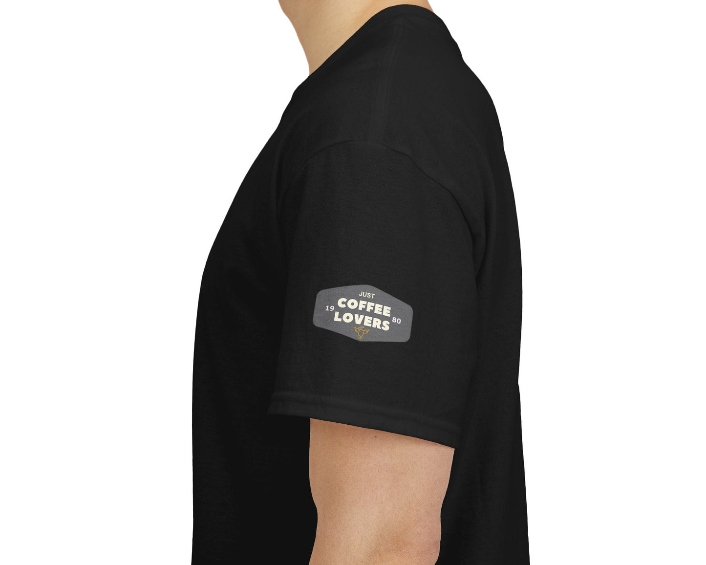 Coffee Lovers Cotton Tee - 'Better Late than Never', Black t-shirt with a logo on the sleeve worn by a person, white background