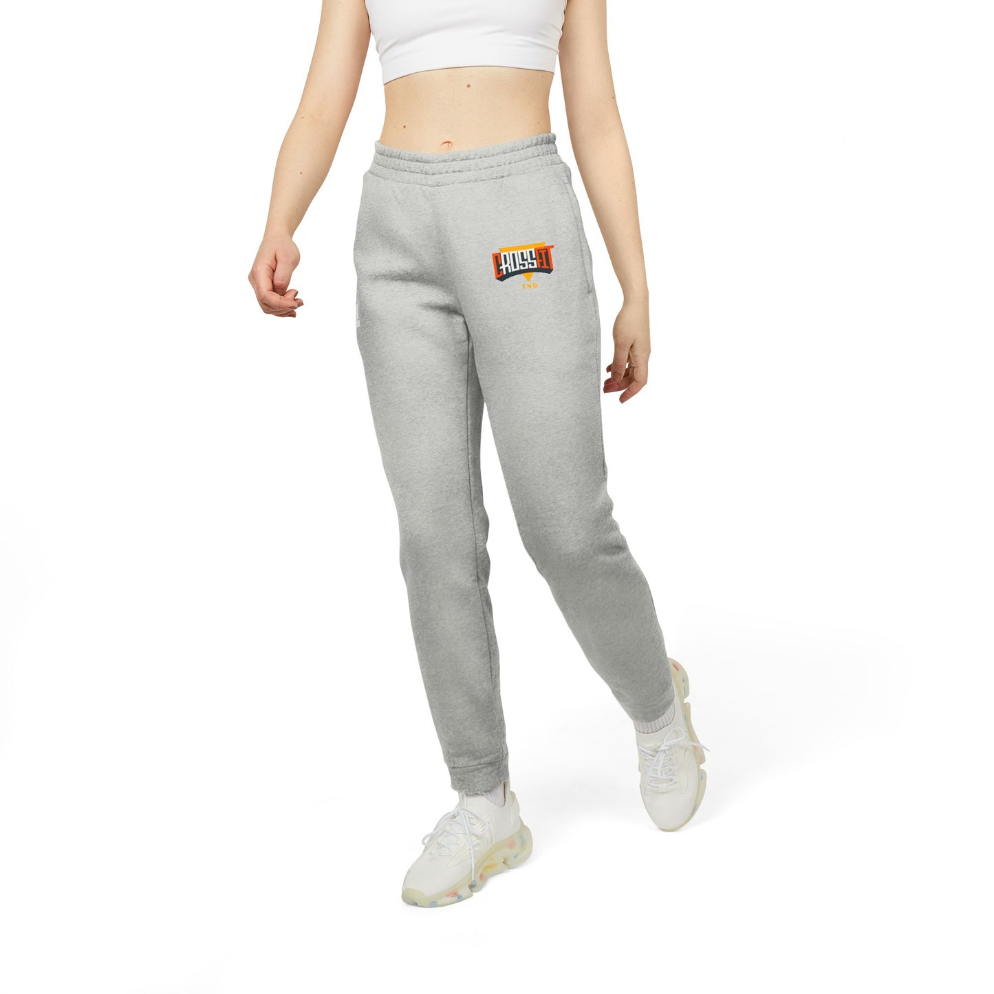 Adidas Sports Fleece Joggers for CrossFit Enthusiasts, Person wearing gray sweatpants with a logo on a white background