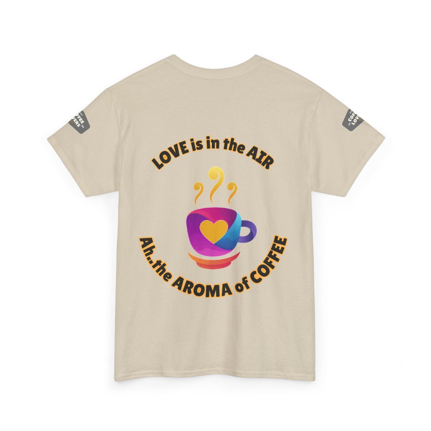 Coffee Lovers Tee with Quote - 'Love is in the Air Ah.. the Aroma of Coffee',  Beige t-shirt with coffee-themed design and text on a white background