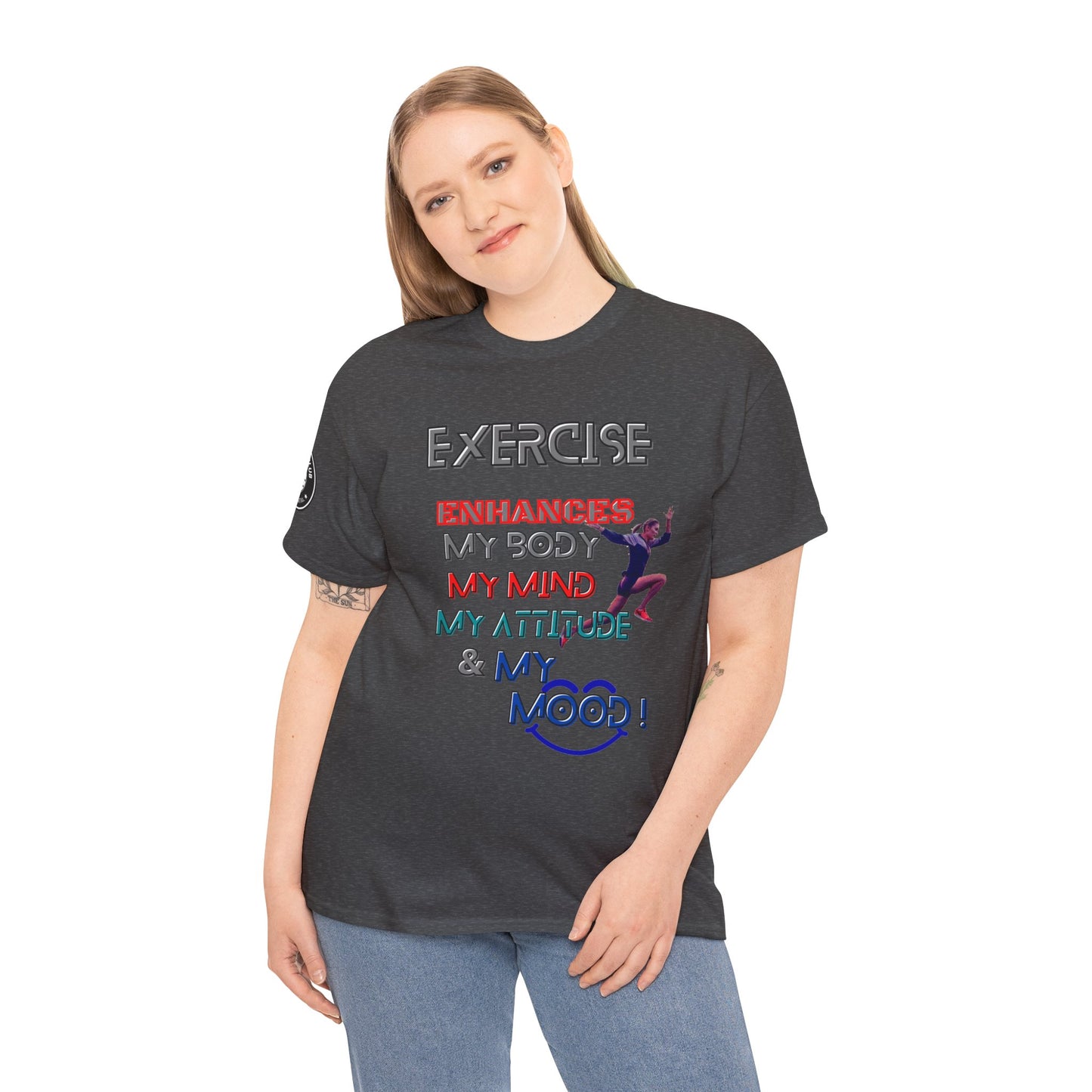 Fitness Quotes Gym Heavy Cotton Tee - Exercise enhances My Body T-shirt. Person wearing a dark gray t-shirt with colorful text on a white background