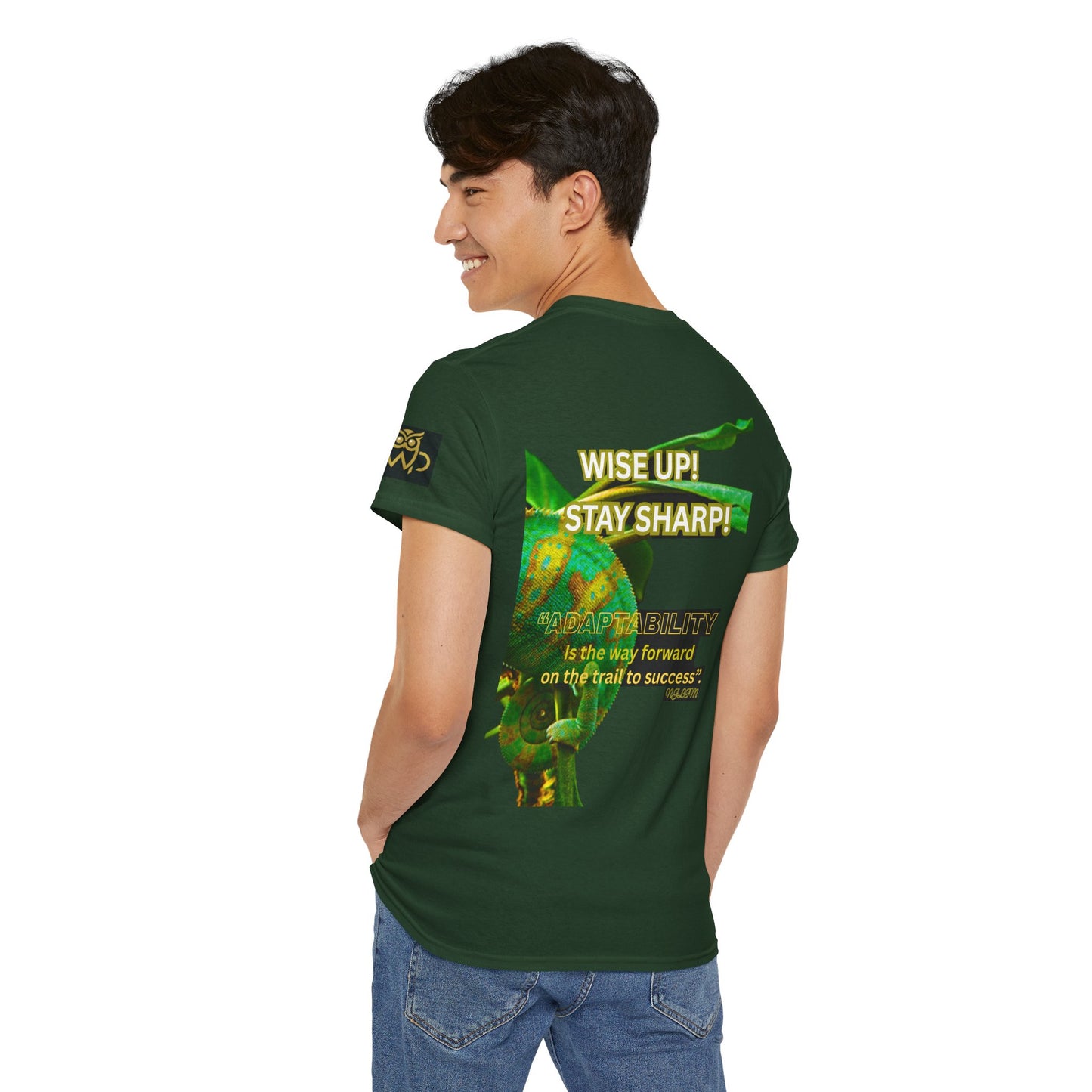 Wise Up Adapt! Motivational T-shirt — 'Wise Up! Stay Sharp!' Graphic Novelty Tee, Person wearing a green t-shirt with text and graphics on the back, standing against a white background