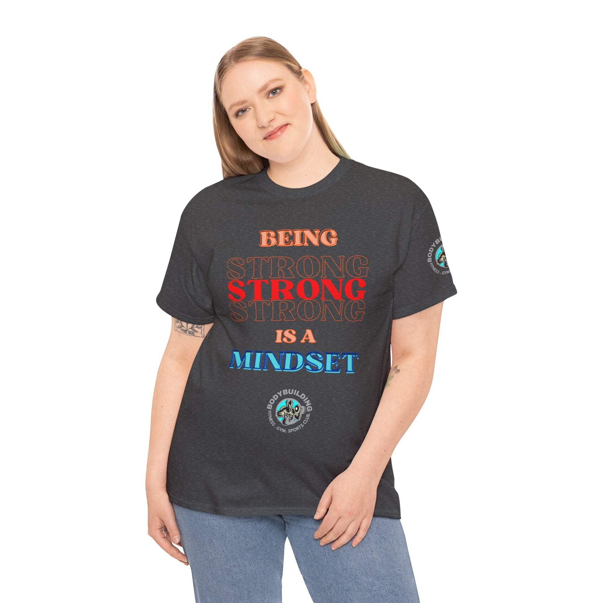 Gym Fitness Tee - BEING STRONG IS A MINDSET. Person wearing a black t-shirt with motivational text on a white background