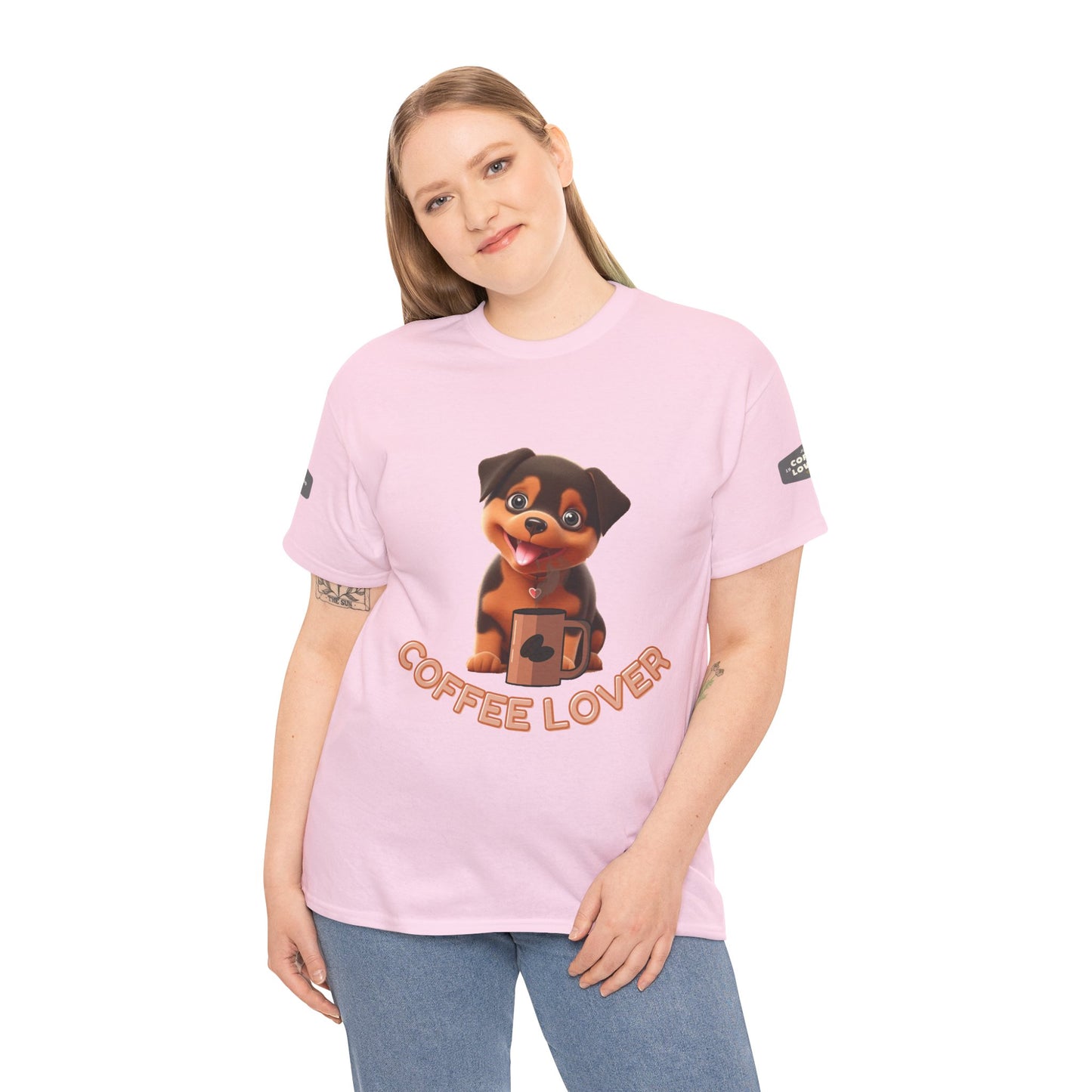 COFFEE LOVERS COTTON TEE for Dog Lovers. Person wearing a pink t-shirt with a dog graphic and 'Coffee Lover' text on a white background