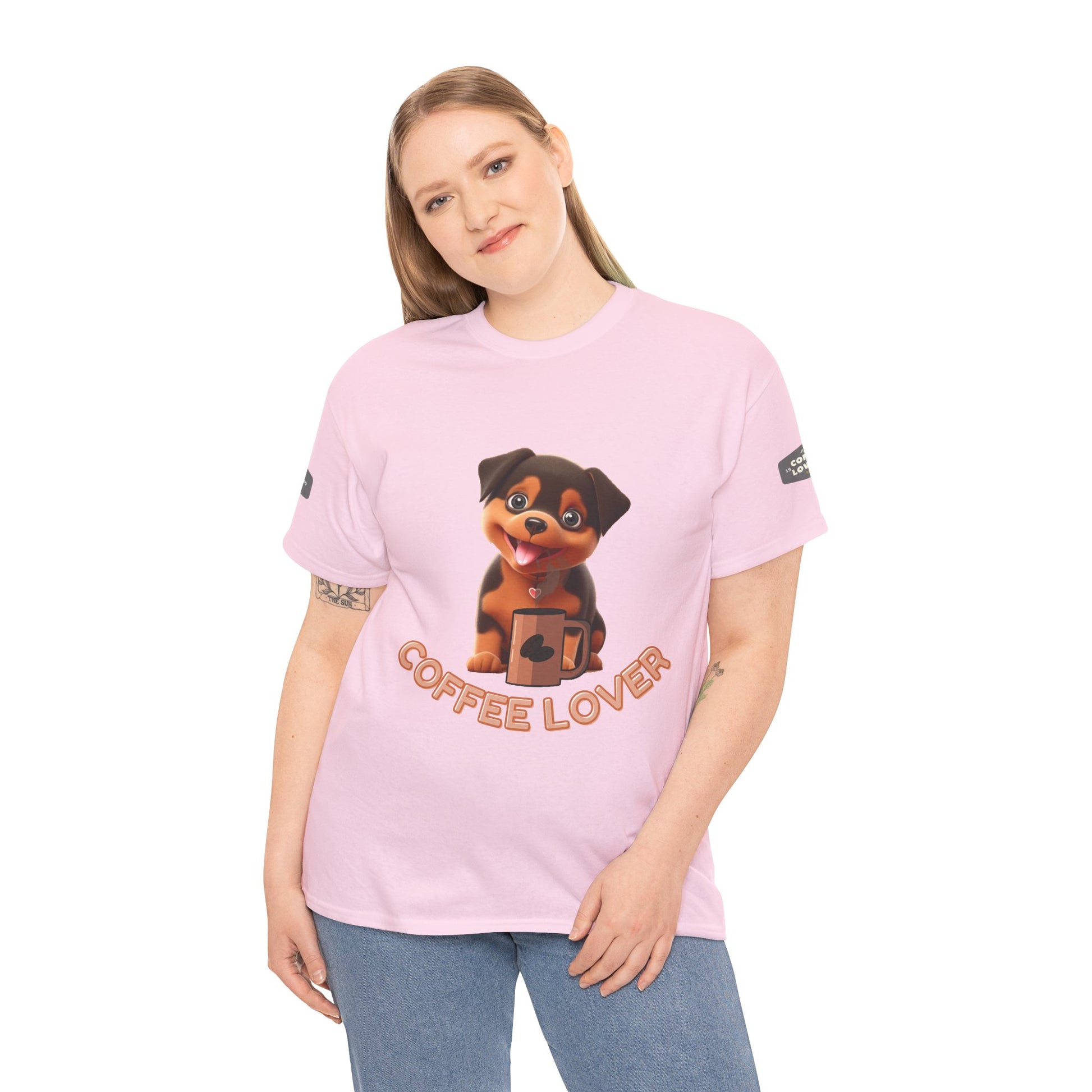 COFFEE LOVERS COTTON TEE for Dog Lovers. Person wearing a pink t-shirt with a dog graphic and 'Coffee Lover' text on a white background