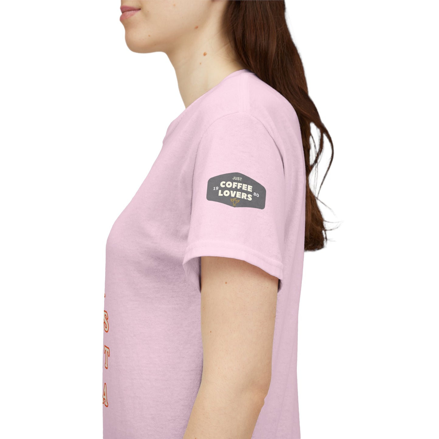 Coffee Lovers Cotton Tee for Female Barista, Person wearing a pink t-shirt with a logo on the sleeve against a white background