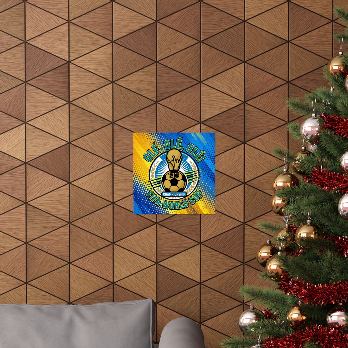 Decorative poster with a soccer ball design on a geometric-patterned wall next to a Christmas tree.