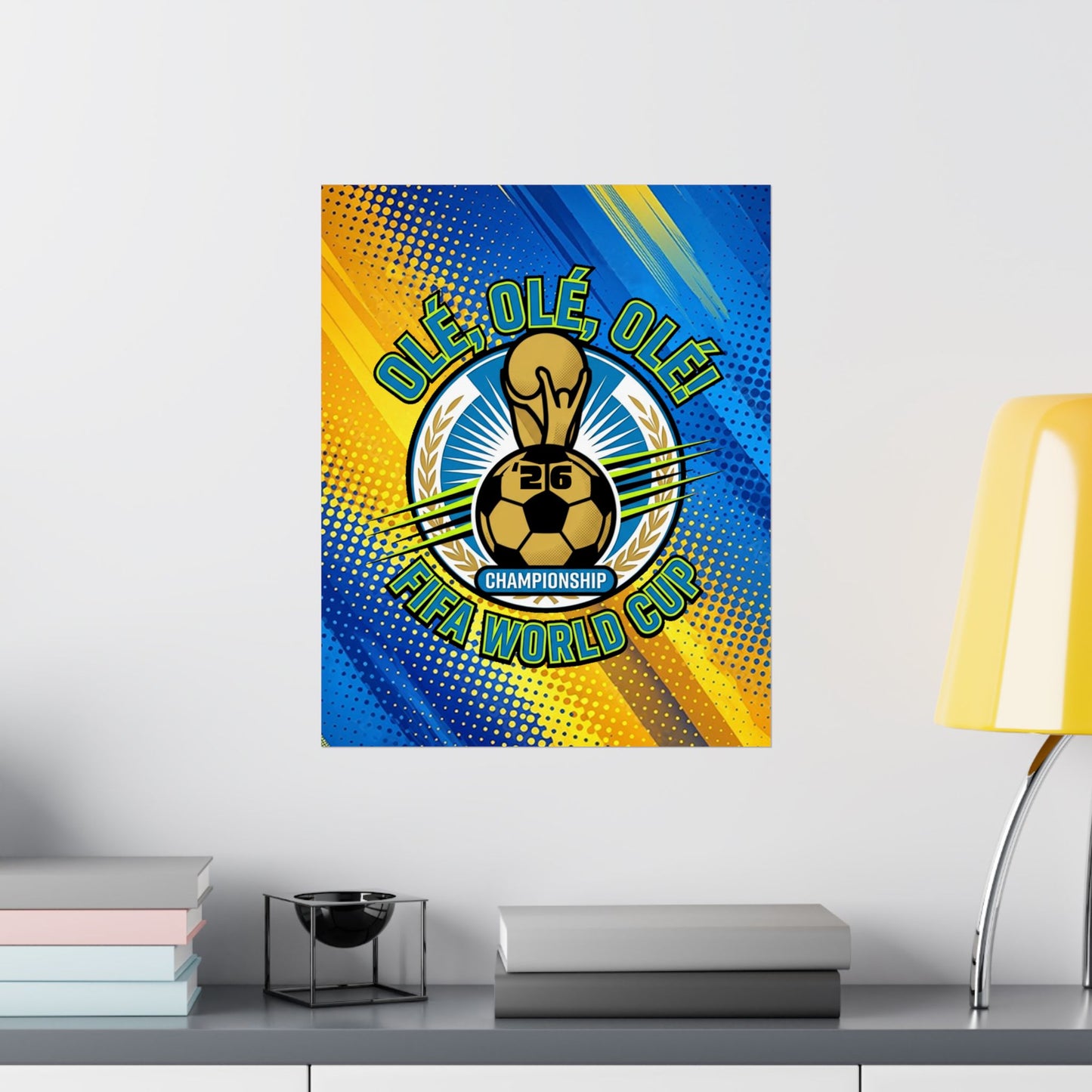 FIFA World Cup-themed decorative poster on a wall with books and a lamp in the foreground.