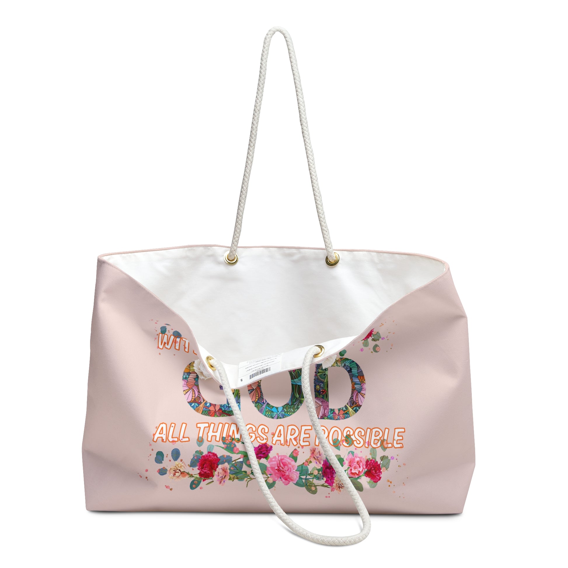 Pink tote bag with floral design and text on a white background