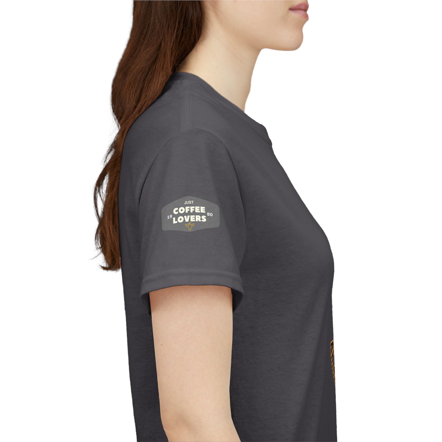 Coffee Lovers Tee with Quote - 'Love is in the Air Ah.. the Aroma of Coffee',  Person wearing a dark gray t-shirt with a logo on the sleeve against a white background