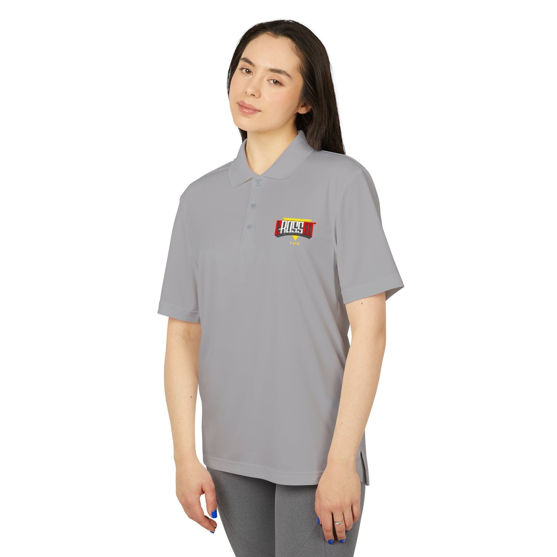 Adidas Sports Polo Shirt for CrossFit Enthusiasts, Woman wearing a gray polo shirt with a logo on a white background