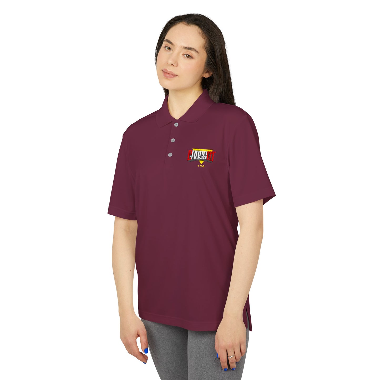 Adidas Sports Polo Shirt for CrossFit Enthusiasts, Woman wearing a maroon polo shirt with a logo on a white background