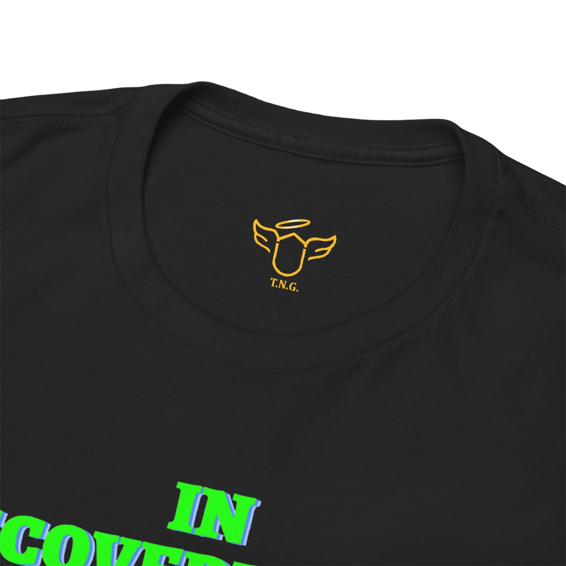 Black t-shirt with yellow logo and green text on a white background