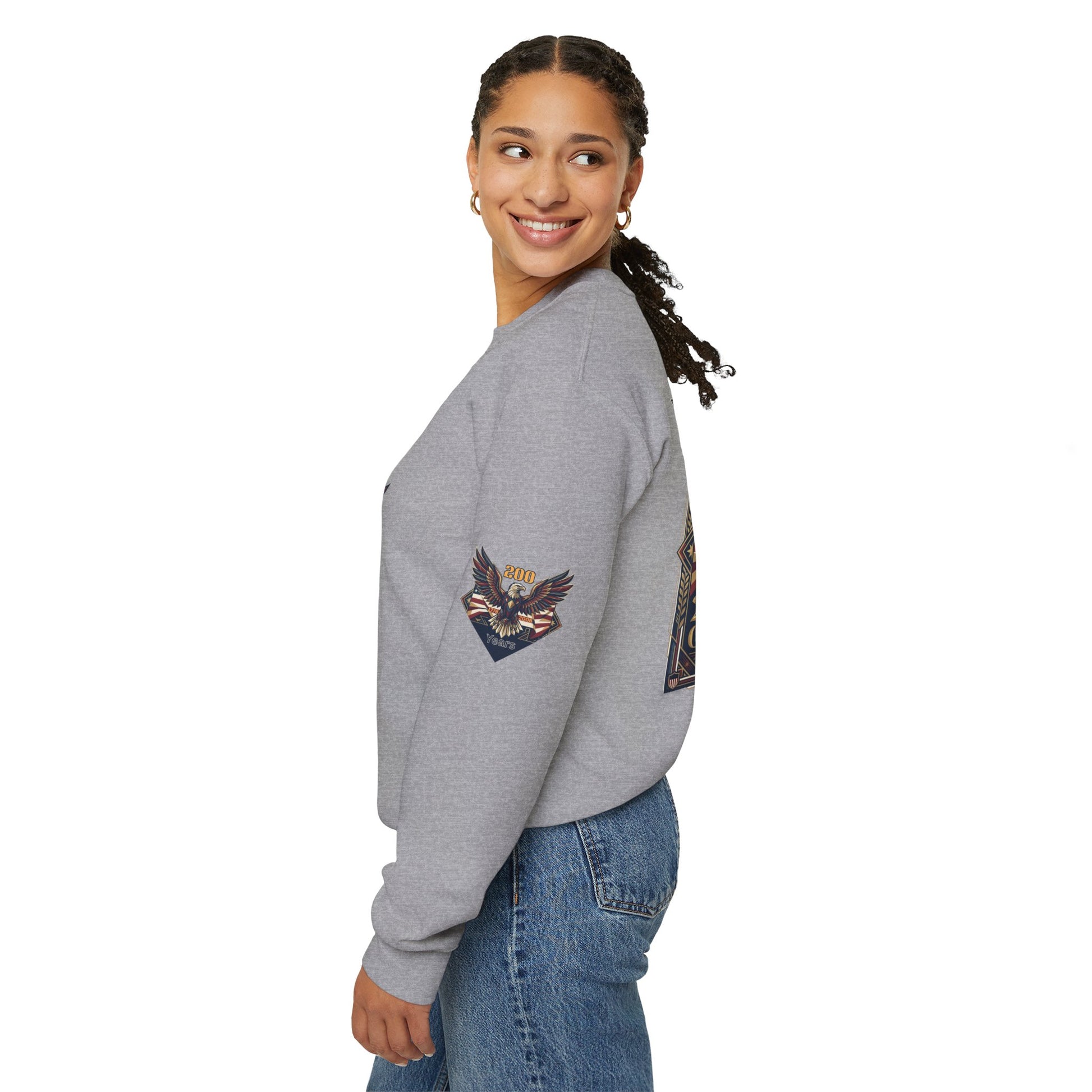 USA 250th ANNIVERSARY Crewneck Sweatshirt , Woman wearing a gray sweatshirt with eagle design on a white background