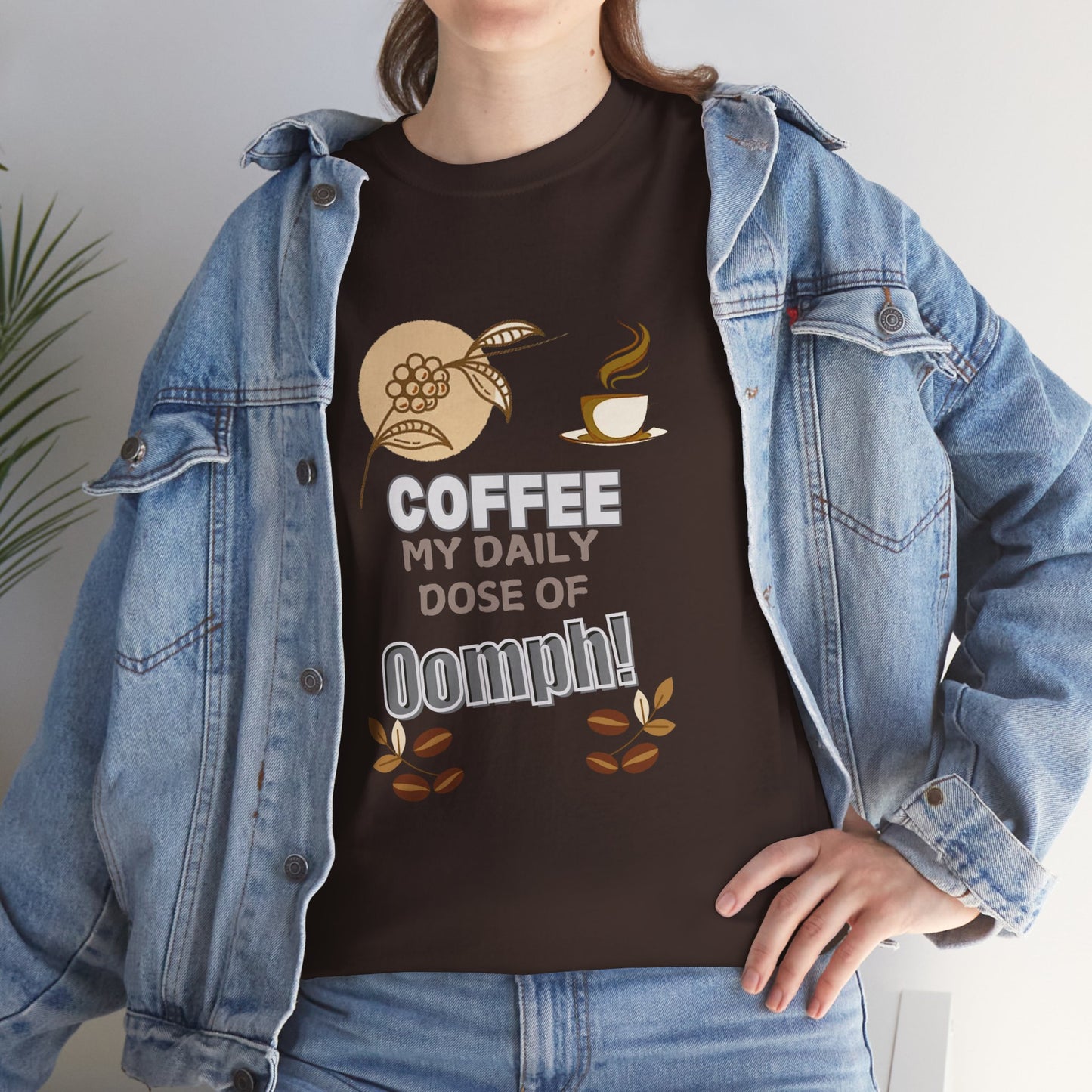 Coffee Lovers Heavy Cotton Tee - My Daily Dose of Oomph! Person wearing a brown t-shirt with coffee-themed design and denim jacket.