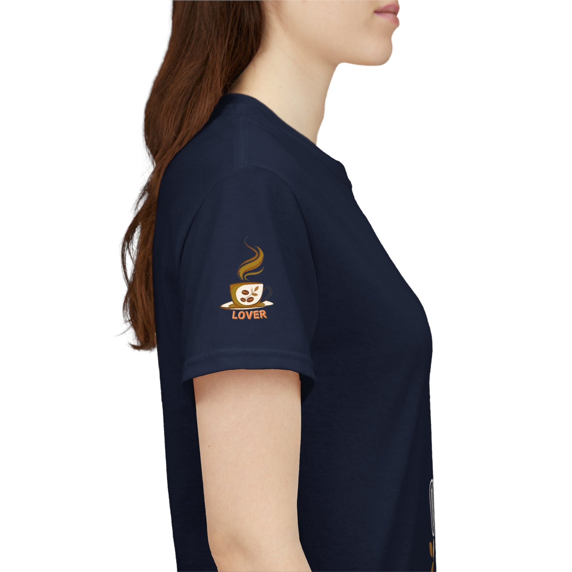 Coffee Lovers Heavy Cotton Tee - My Daily Dose of Oomph! Navy blue t-shirt with a coffee-themed graphic on the sleeve, worn by a person.