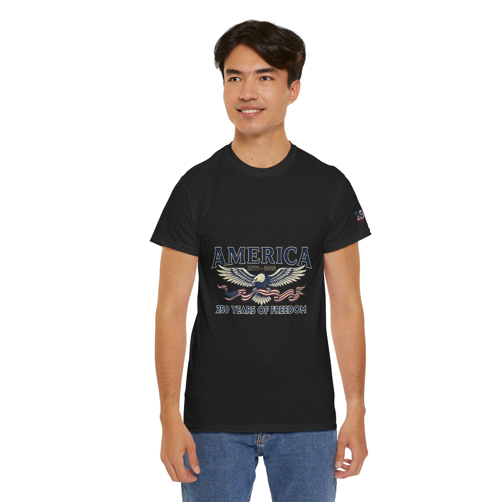 America 250 Years of Freedom T-Shirt — USA 250th ANNIVERSARY T-shirt, Person wearing a navy blue t-shirt with a graphic design on a white background