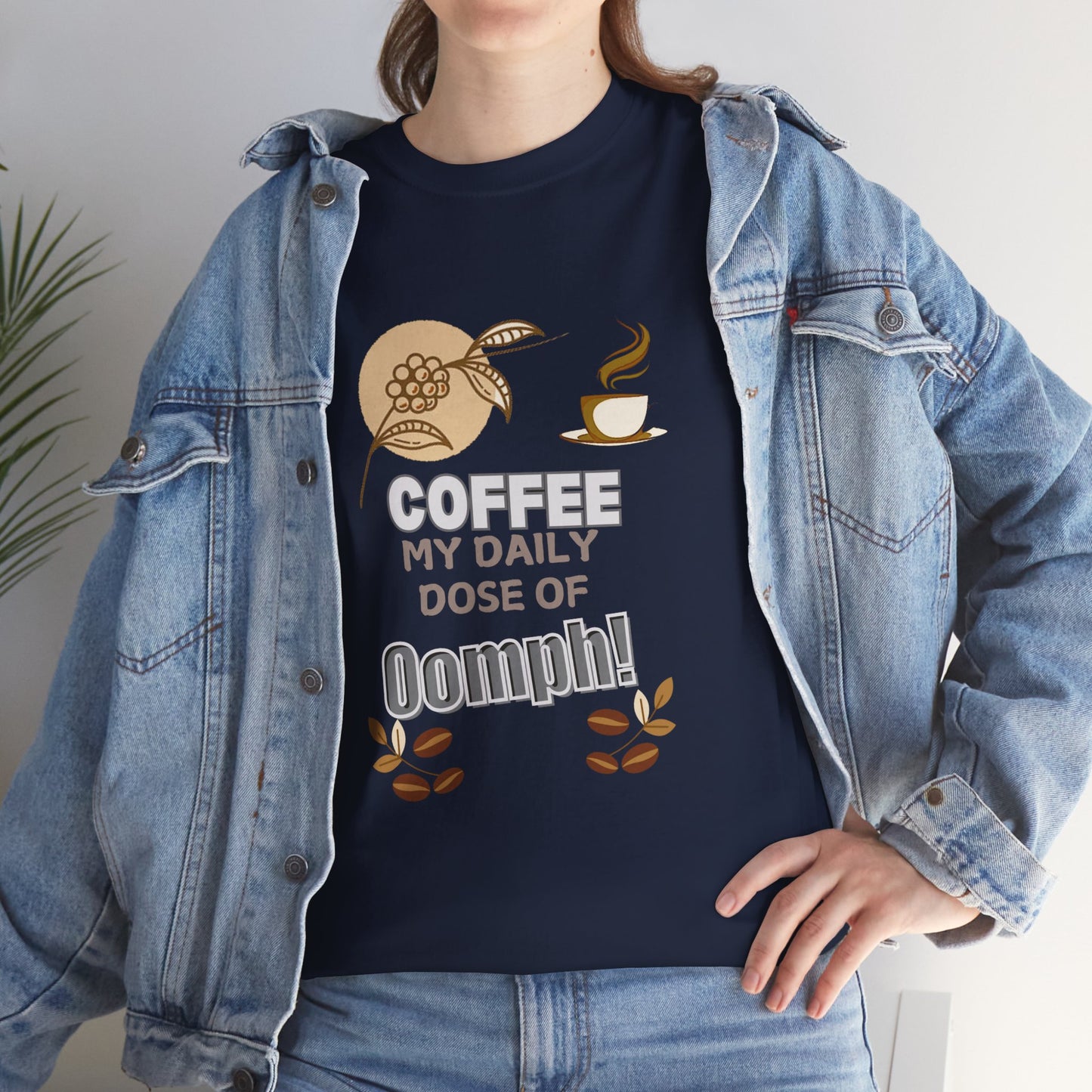 Coffee Lovers Heavy Cotton Tee - My Daily Dose of Oomph! Person wearing a navy blue t-shirt with a coffee-themed design and denim jacket.