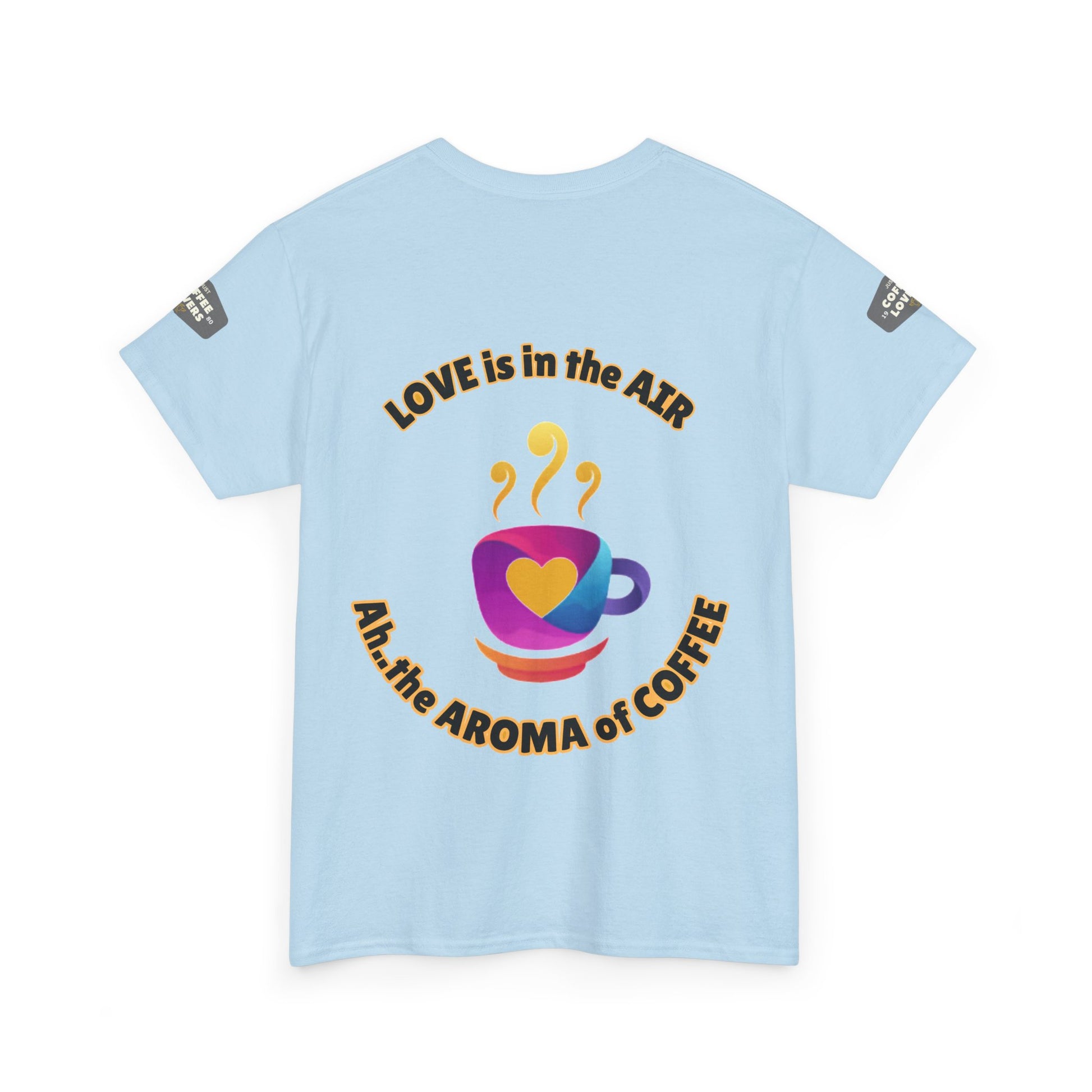 Coffee Lovers Tee with Quote - 'Love is in the Air Ah.. the Aroma of Coffee',  Light blue t-shirt with colorful coffee cup design and text on a white background