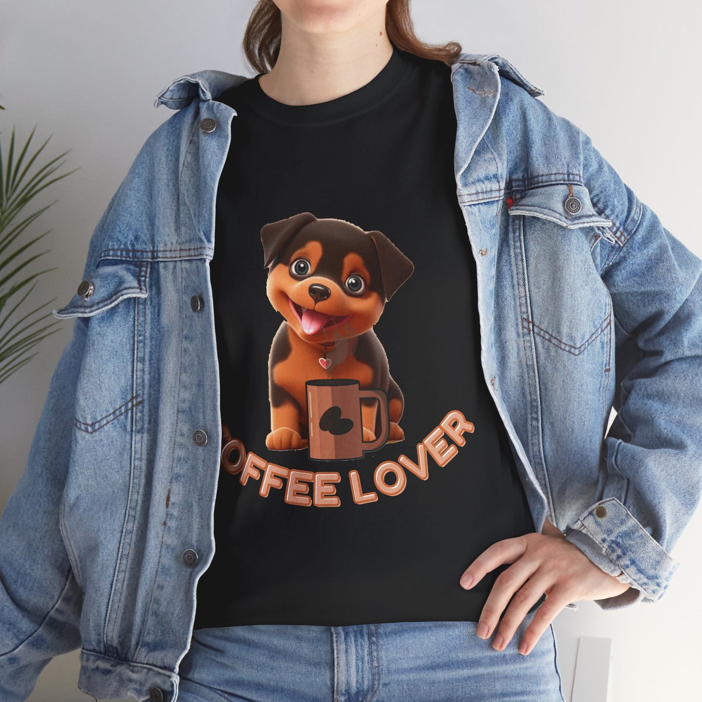 COFFEE LOVERS COTTON TEE for Dog Lovers. Person wearing a black t-shirt with a dog and 'Coffee Lover' text, paired with a denim jacket.