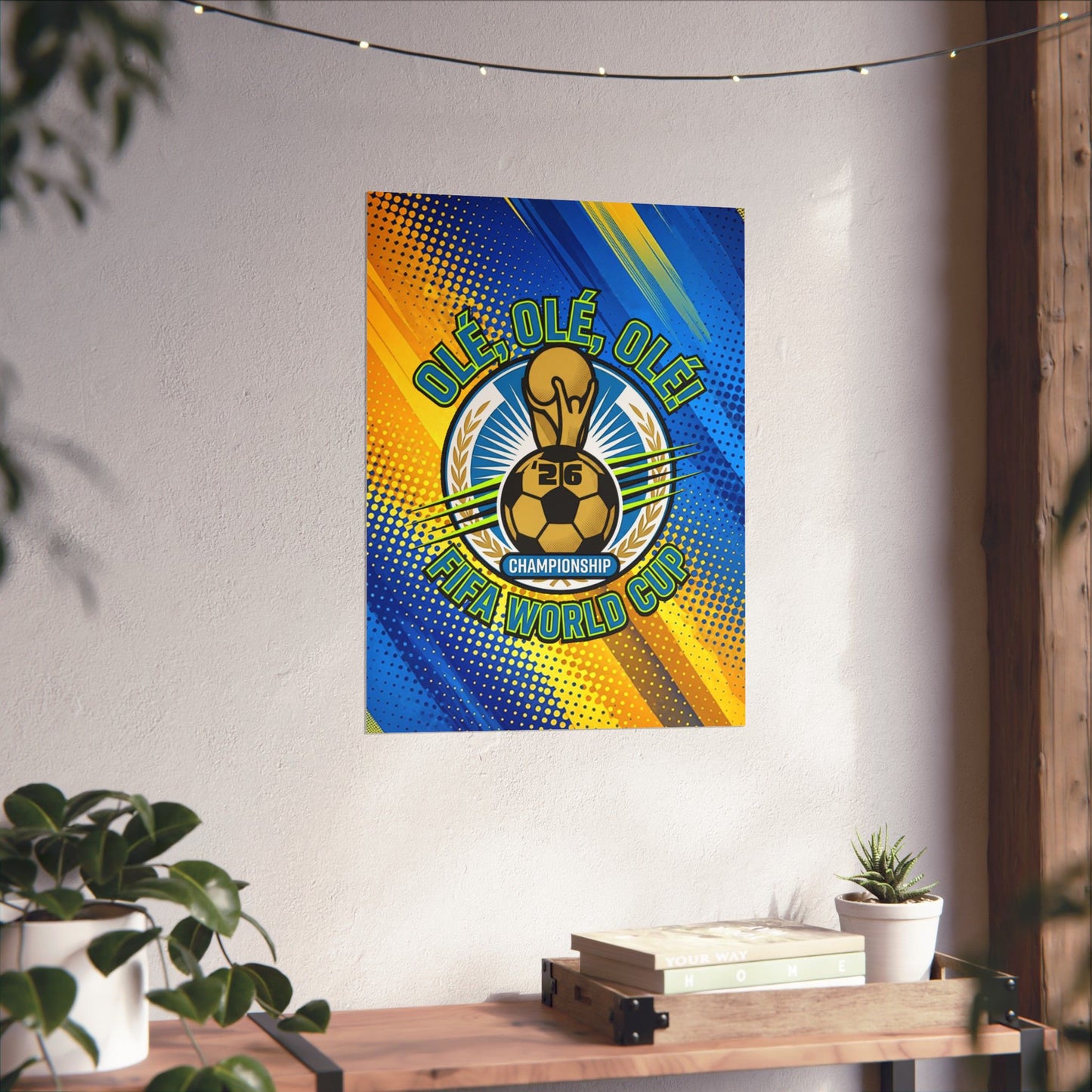 FIFA World Cup-themed decorative banner on a wall with a table and plants below.