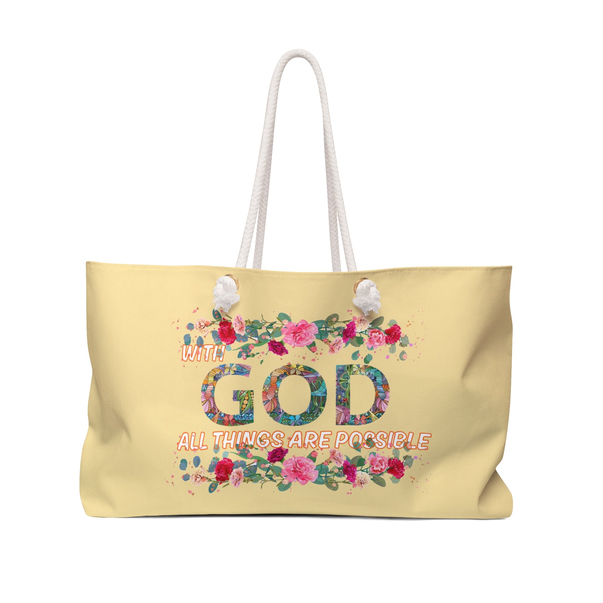 Yellow tote bag with floral design and motivational quote on a white background