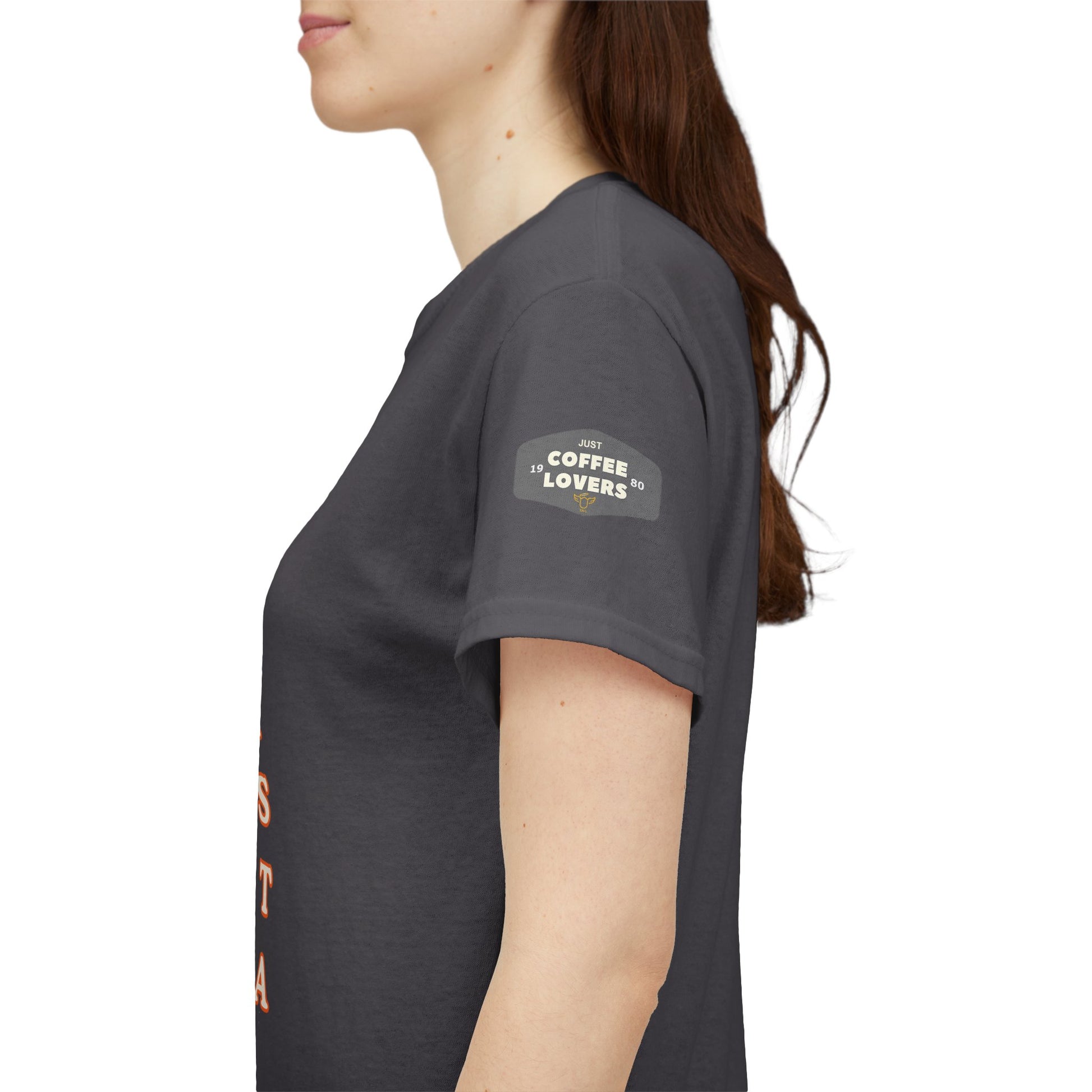 Coffee Lovers Cotton Tee for Female Barista, Person wearing a dark gray t-shirt with text on the sleeve against a white background