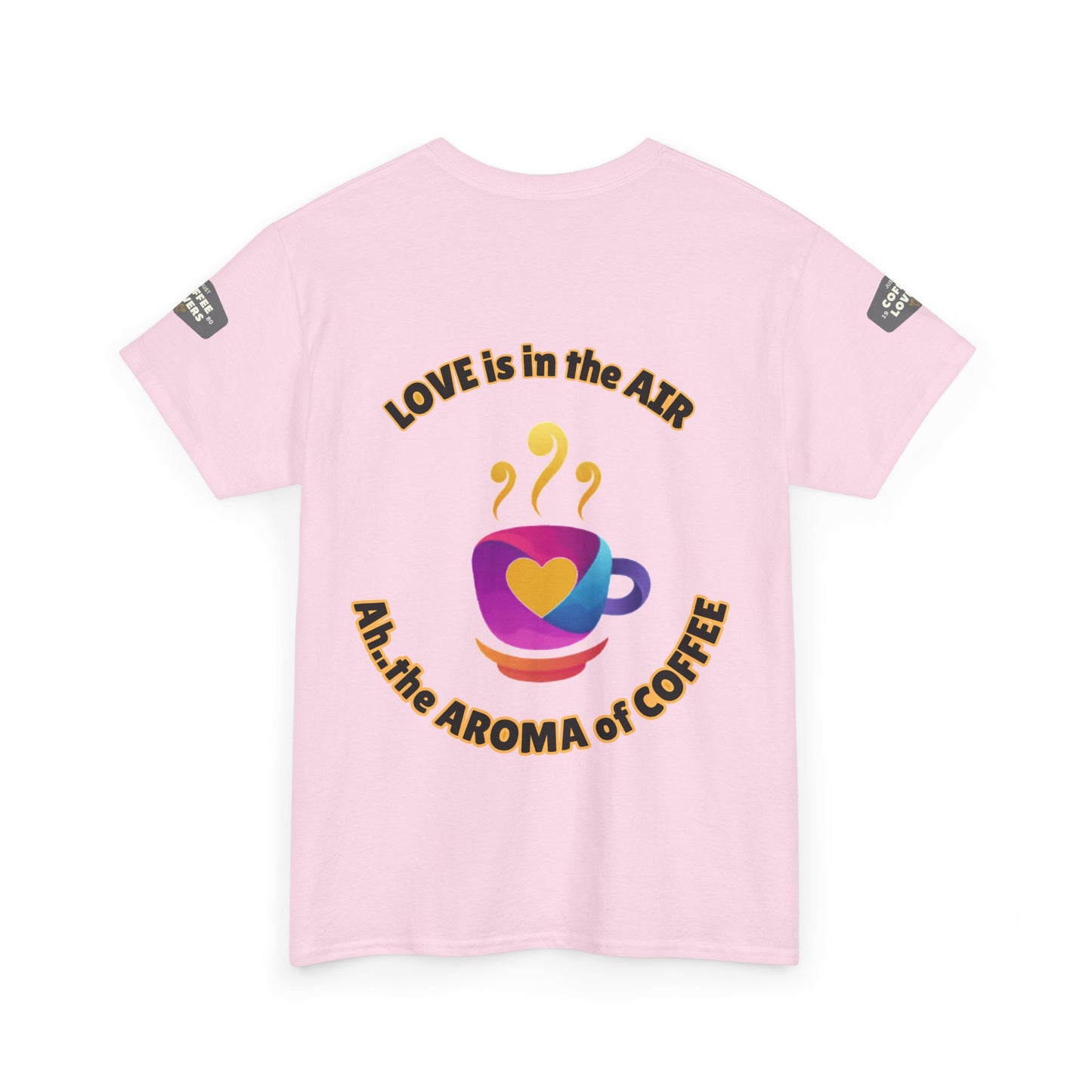 Coffee Lovers Tee with Quote - 'Love is in the Air Ah.. the Aroma of Coffee',  Pink t-shirt with coffee-themed graphic and text on a white background