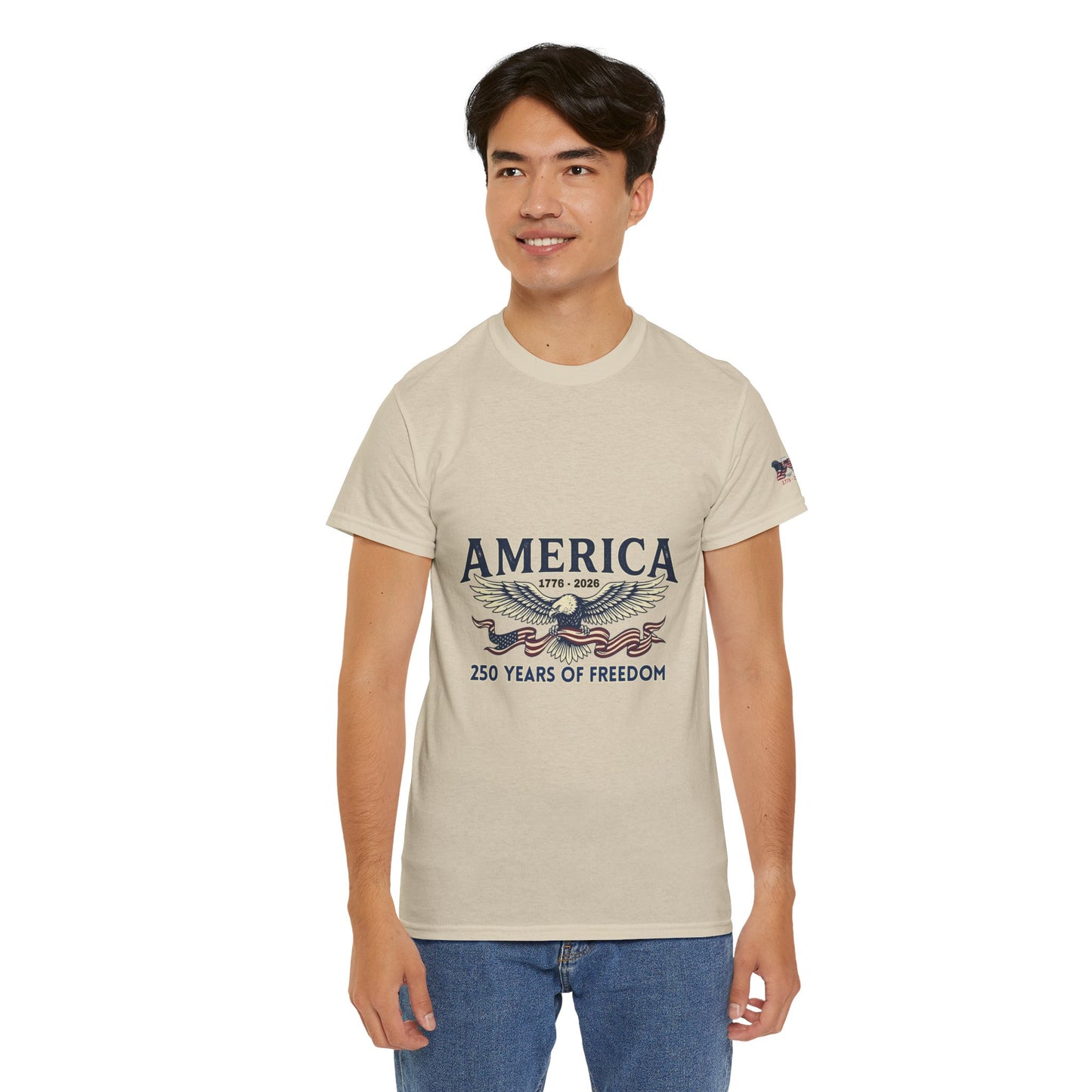 America 250 Years of Freedom T-Shirt — USA 250th ANNIVERSARY T-shirt, Man wearing a beige t-shirt with 'America' graphic design on a white background
