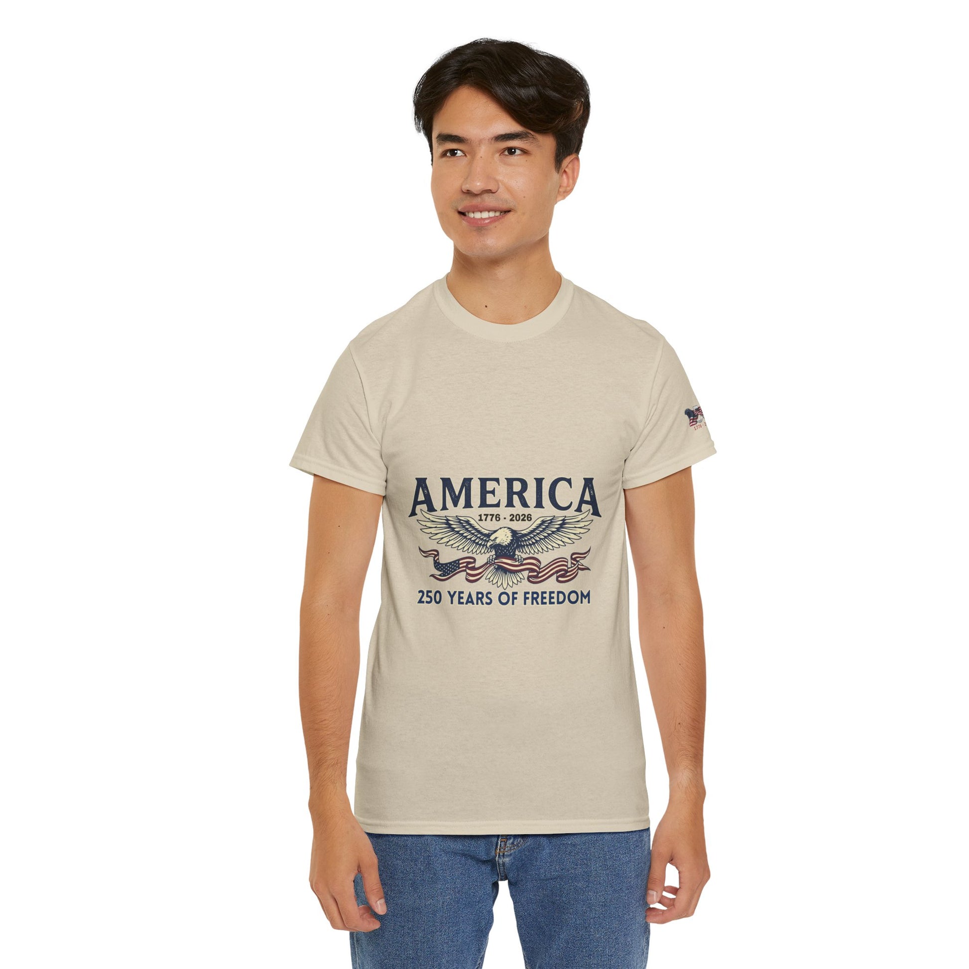 America 250 Years of Freedom T-Shirt — USA 250th ANNIVERSARY T-shirt, Man wearing a beige t-shirt with 'America' graphic design on a white background